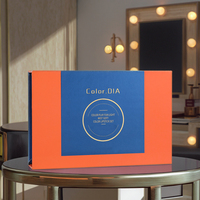Scatola per Confezione Rossetto Personalizzata a Forma di Libro in Cartoncino Rigido Argentato con Goffratura, Laminazione Opaca e UV, Chiusura Magnetica