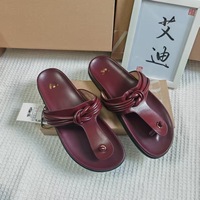 Sandales plates d'été pour femmes 2025, style romain, légères, en cuir PU, à bout ouvert, avec boucle, motif uni, semelle intermédiaire en TPR