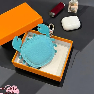 Nueva funda de cuero con forma de cangrejo para auriculares AirPods Bluetooth, bolsa de almacenamiento con cremallera para llavero y accesorios. - Product Image 1