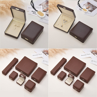 Boîte à bijoux rectangulaire de luxe personnalisée en cuir PU 2025 avec motif carré pour ranger bagues, colliers et boucles d'oreilles