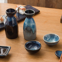 Mini tasse à saké en céramique émaillée de couleur bleue à changement de four de style rétro japonais pour la maison et le restaurant