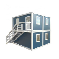 Maison modulaire préfabriquée à double étage, structure en acier, murs en panneaux sandwich, porte en acier, fenêtres coulissantes en PVC