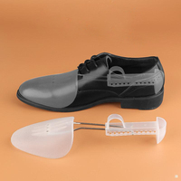 Embauchoirs en plastique ajustables avec logo personnalisé pour hommes et femmes, vente en gros d'usine, étire-chaussures, protection anti-plis