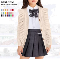 Fábrica de ropa personalizada Ventas al por mayor Niños Ropa de invierno Manga larga Hueco Cardigan Suéteres Niñas Suéter personalizado