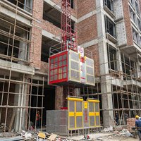 Ascenseur de chantier électrique OEM HT SC200U avec moteur puissant, frein de sécurité, capacité de 2000 kg, 9 personnes, faible entretien