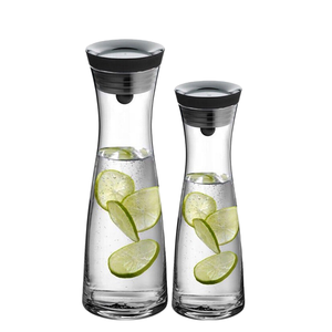 Jarra <span class=keywords><strong>de</strong></span> agua <span class=keywords><strong>de</strong></span> vidrio <span class=keywords><strong>de</strong></span> borosilicato <span class=keywords><strong>de</strong></span> 1500ml con tapa <span class=keywords><strong>de</strong></span> plástico y filtro para tetera o olla <span class=keywords><strong>de</strong></span> agua en uso en restaurante - Product Image 1