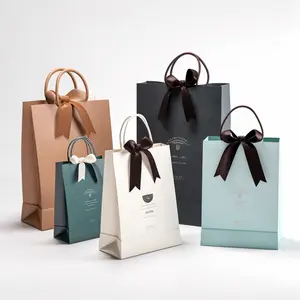 Luxury ribbon handle shopping bag clothing packaging customized printed euro tote paper gift bags with logo