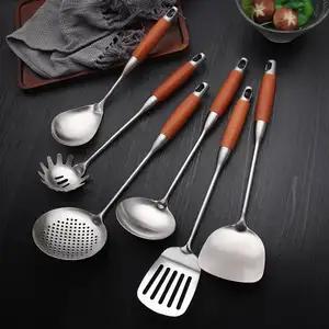 Nouvel arrivage d'ustensiles de cuisine en acier inoxydable ensemble De Cocina manche en bois accessoires de cuisine outils de cuisson en acier