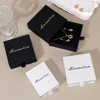 Nouvelle boîte à bijoux rectangulaire haut de gamme noire et blanche avec doublure en éponge pour bagues, bracelets, colliers, emballage exquis pour bracelets