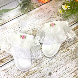 Grossiste Adorable Chaussettes tricotées à la main pour bébés avec broderie florale à la main - Product Image 1