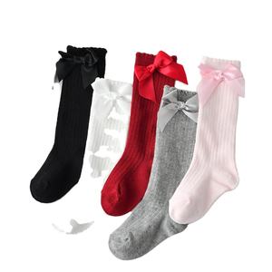 Милые однотонные Хлопковые гольфы до колена с бантом для детей - Product Image 1