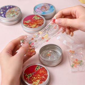 ของเล่นดินน้ำมันคริสตัลรูปเปลือกหอยสีฟ้าวิบวับ ประดับด้วยกลิตเตอร์ ของเล่นเสริมพัฒนาการ ของชำร่วยงานปาร์ตี้ ขายส่ง บรรจุในกระป๋องโลหะ ของขวัญ - Product Image 2