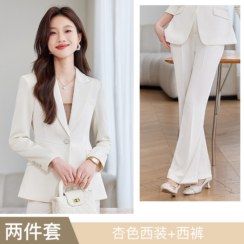 apricot-colored suit with slightly flared trousers