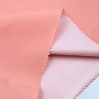 Tissu en microfibre enduit de polyester recyclé 100% imperméable, teint uni, peau de pêche, 120 g/m², largeur 150 cm