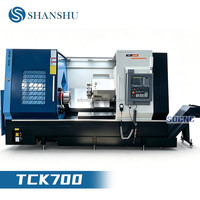 Tour CNC à banc incliné TCK700 avec système Fanuc, tourelle servo-hydraulique à 12 stations, bras de réglage d'outils Renishaw, contre-embout rotatif interne