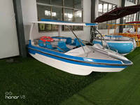 Jouets aquatiques pour les vacances d'été Bateau électrique pour 8 personnes avec pédalier familial en fibre de verre Bateau à main