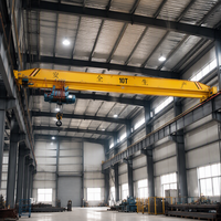 Pont roulant monopoutre sur rail avec palan pour le chargement et le déchargement de marchandises dans les hangars logistiques