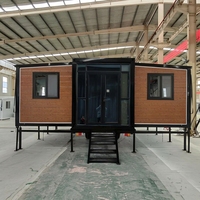 Maison modulaire extensible personnalisable en structure acier, type conteneur, avec chambre, salle de bain et cuisine