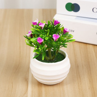 Vente en gros pour fabricants : Pot de fleurs artificielles créatif avec petites roses solides 'Sept étoiles' et plantes vertes, pour la remise des diplômes et la fête des Mères