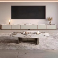 Table basse en panneau rocheux de luxe léger, design moderne et simple, salon, design avancé, table basse ovale en acier inoxydable