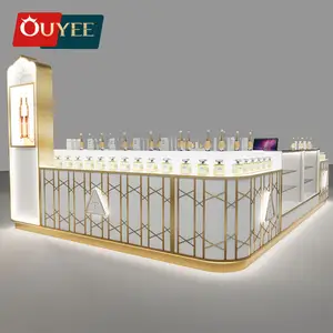 High End Customized Perfume Shop Design Showcase Fragrance Display Counter Gold Stainless Steel Mall Perfume Kiosk With Lighting