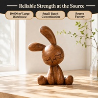 Figurine de lapin en résine à effet grain de bois rustique avec motif cœur pour la décoration de table et d'étagère dans le salon, vente en gros