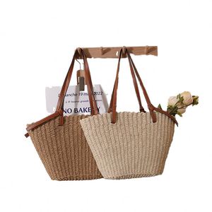 กระเป๋าถือสานฟางโบฮีเมียนสำหรับเดินทางฤดูร้อน ทำมือ แฟชั่นสำหรับผู้หญิง สะพายไหล่เดียว ใช้ได้ที่ชายหาด - Product Image 1
