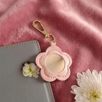 Miroir de maquillage miniature en cuir PU tendance, miroir en forme de fleur adorable, accessoire de sac à main multifonctionnel, pendentif pour femmes