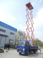 Plateforme élévatrice à ciseaux hydraulique électrique en acier inoxydable de haute qualité avec une capacité de 1000 kg pour quai de chargement d'entrepôt