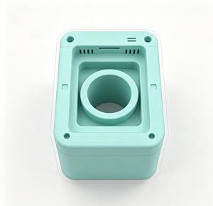 Service de pièces en plastique ABS moulées par injection sur mesure avec cylindre central et trous de fixation en couleur vert menthe - Product Image 2