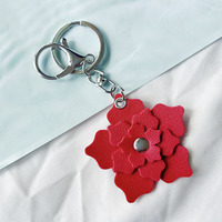 Porte-clés en cuir en gros, mini porte-clés fleur en cuir, breloque de sac en cuir, diffuseur, porte-clés de voiture avec logo personnalisé, anneau porte-clés
