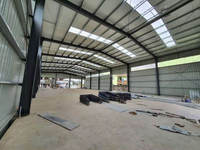 Entrepôt/atelier moderne en structure métallique architecturale à grande portée pour usine industrielle professionnelle