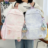 Sac à dos de voyage léger et polyvalent pour femmes et hommes, sac d'école confortable pour les trajets quotidiens avec pendentif ours en peluche