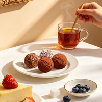 Disponible en OEM/ODM : Boules de chocolat truffé au noix, enrobées de cacao, confiserie, collation