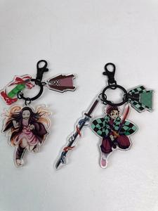 Anime Tanjirou Demon Slayer <span class=keywords><strong>Kimetsu</strong></span> <span class=keywords><strong>no</strong></span> <span class=keywords><strong>Yaiba</strong></span> Inosuke Tomioka Giyuu Kochou Shinobu arma Cosplay llavero espada llavero colgante - Product Image 4