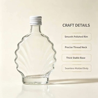 Bouteille de liqueur en verre transparent de 500 ml avec bouchon à vis, options personnalisées de sérigraphie et gravure mat/serigraphié