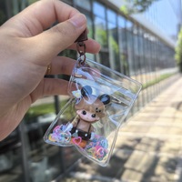 Cadeaux DIY : Porte-clés en peluche PVC transparent, pendentif poupée floquée, mini jouet de dessin animé avec sequins en forme de cœur, breloque de sac