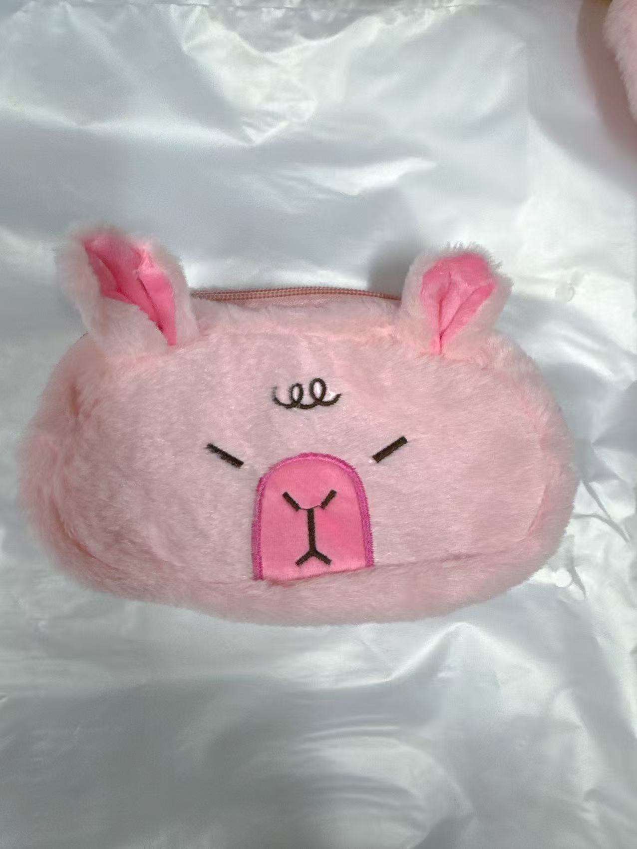 Pink kabi bala pencil case (squinting)