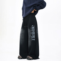 Pantalon de survêtement homme ample et polyvalent en coton foncé, coupe droite, avec imprimé lettres rétro américain tendance et taille mi-haute à cordon de serrage
