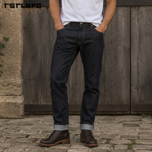 Jeans de mezclilla cruda selvedge índigo de 10.5 oz con corte y confección, ajuste original, puntada de cadena dorada, remaches de cobre y etiqueta tejida. Jeans Heritage. - Product Image 3