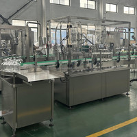 Machine automatique de bouchage et d'étiquetage de bouteilles en verre de whisky spiritueux à 4 têtes pour 250ml 500ml 750ml 1000ml