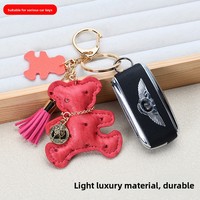 Porte-clés en cuir mignon en forme d'ours, style dessin animé créatif, breloque de sac pour femme, porte-clés de voiture style coréen, fabriqué en Chine