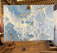 Dalle de marbre onyx bleu rétroéclairée translucide pour mur de fond et comptoir de luxe