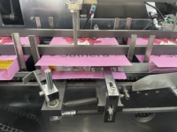 Machine d'emballage automatique pour serviettes hygiéniques, bandages, pansements, sachets et boîtes de cartonnage
