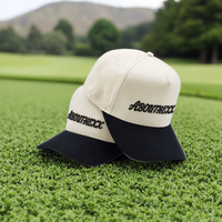 Casquette de baseball personnalisée Abouthexx bicolore crème et noir avec logo brodé en lettres script, visière incurvée, ajustable, snapback, vente en gros