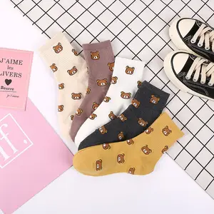 Prix d'usine Chaussettes pour femmes mignonnes en coton personnalisées Chaussettes longues et amusantes Chaussettes multicolores pour femmes et filles