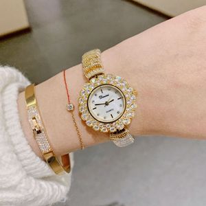 Reloj de pulsera minimalista redondo con diamantes para mujer, pulsera informal de moda, reloj de cuarzo elegante con diamantes completos - Product Image 4