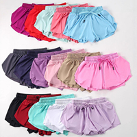 Shorts de sport pour filles en nylon à taille haute avec cordon de serrage, anti-éblouissement, séchage rapide, avec poches, style Europe-Amérique – Nouveauté promotionnelle