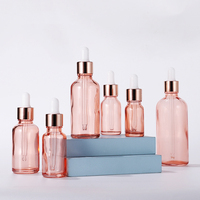 Flacon compte-gouttes en verre rose or rose translucide personnalisé huile essentielle vide 5ml 100ml tailles de bouchon compte-gouttes pour huile essentielle personnalisée