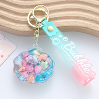 Pendentif porte-clés patte de chat astronaute, bonbon créatif en forme de fève, mignon pendentif bouteille de sable pour sac de voiture